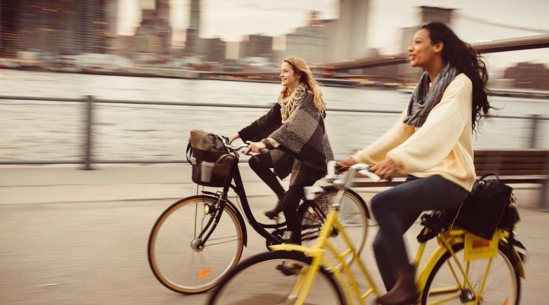 Two women on bicycles 