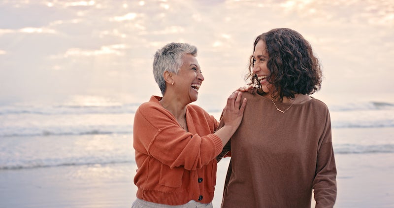 A woman speaking with her older mother