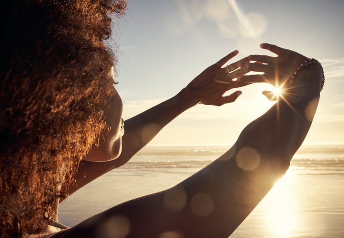 woman on beach sunset 