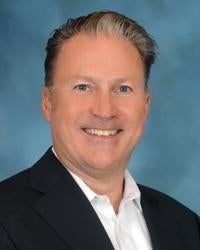 Mark E Caputo