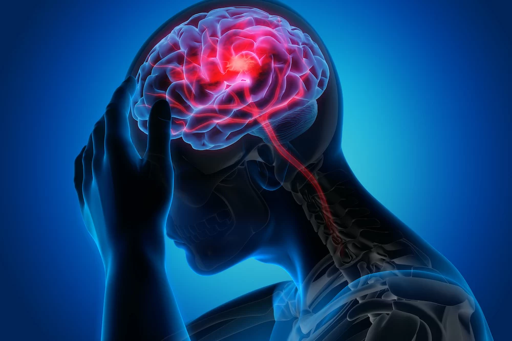 image of someone holding their head 