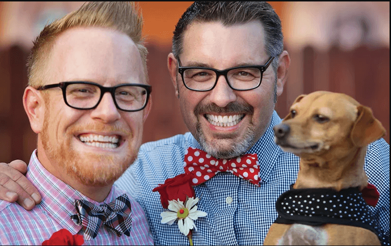 happy couple with dog